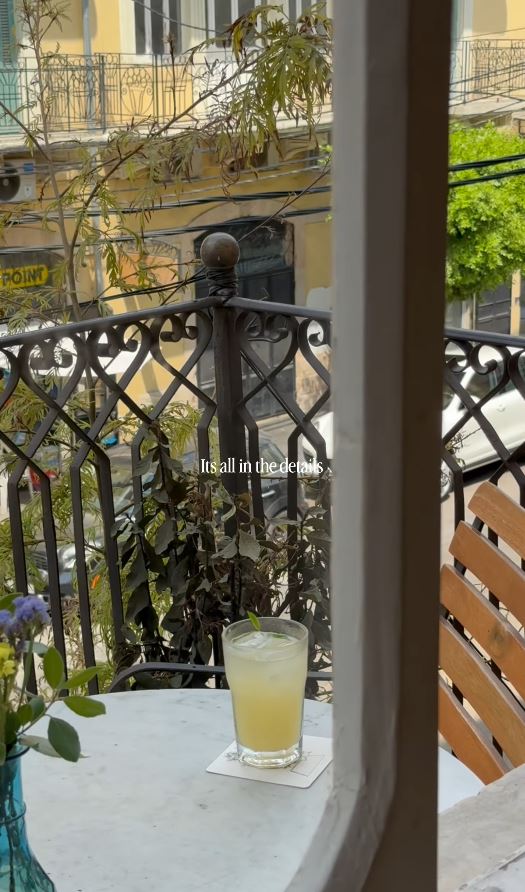 Balcony table with fresh juice and flowers at BEYt